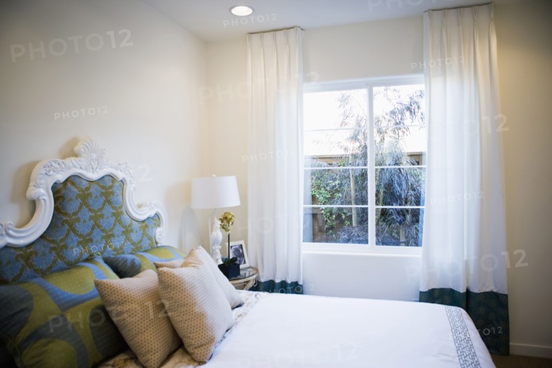 Decorative headboard in contemporary bedroom