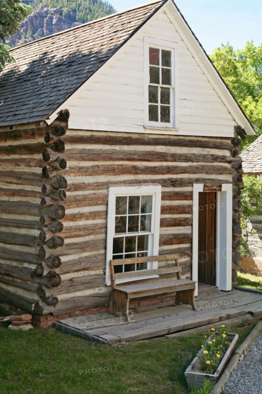 Bench outside log cabin