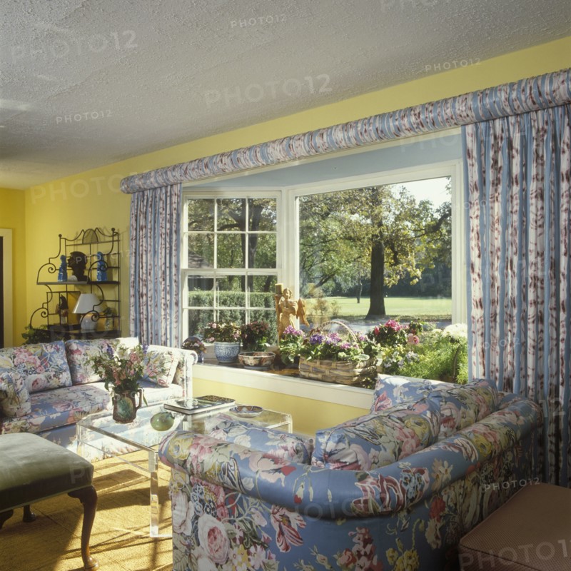 Traditional Living Room - floral chintz upholstered matching sofas and drapery