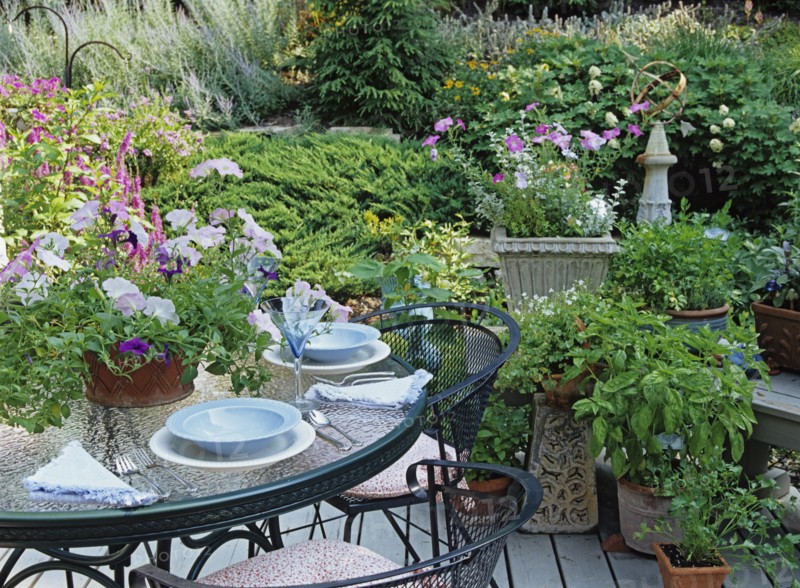 Partial view of table set with dishes on deck