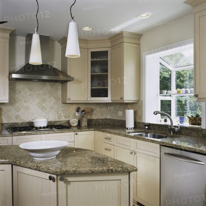 Granite counters in kitchen with triangle work area