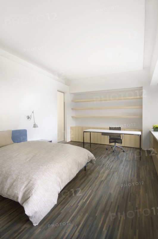 Modern bedroom with hardwood floors