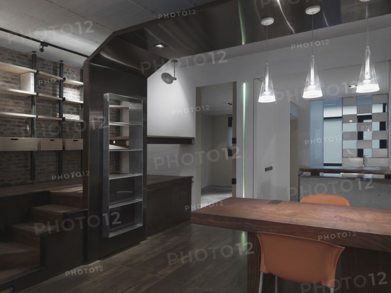 Modern interior with dining table and storage area