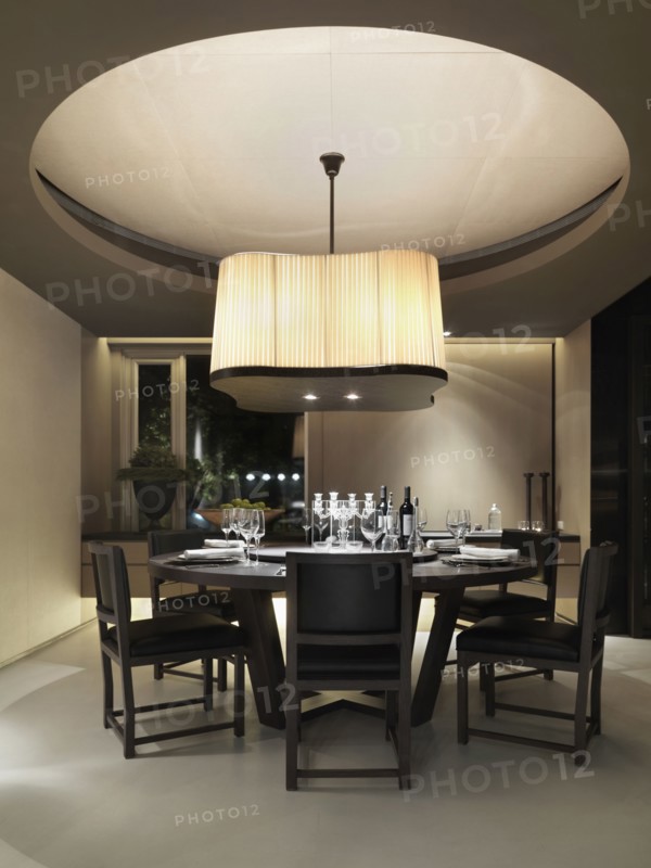 Contemporary dining room with circular dining table