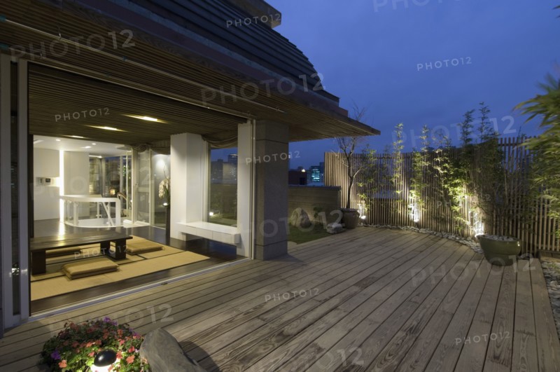 Oriental dining room open to outdoor deck