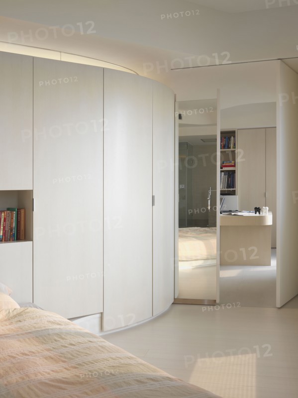 View from modern bedroom into home office
