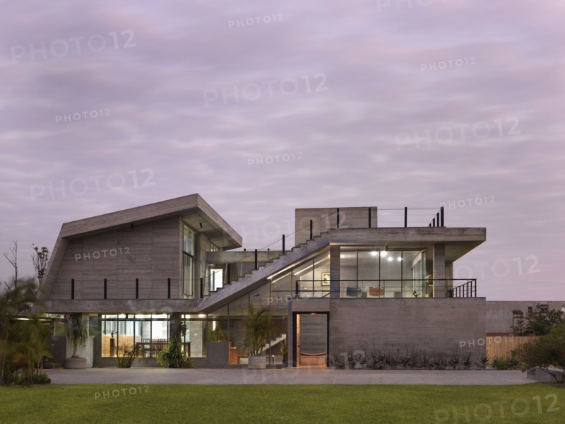 Front exterior modern home at sunset