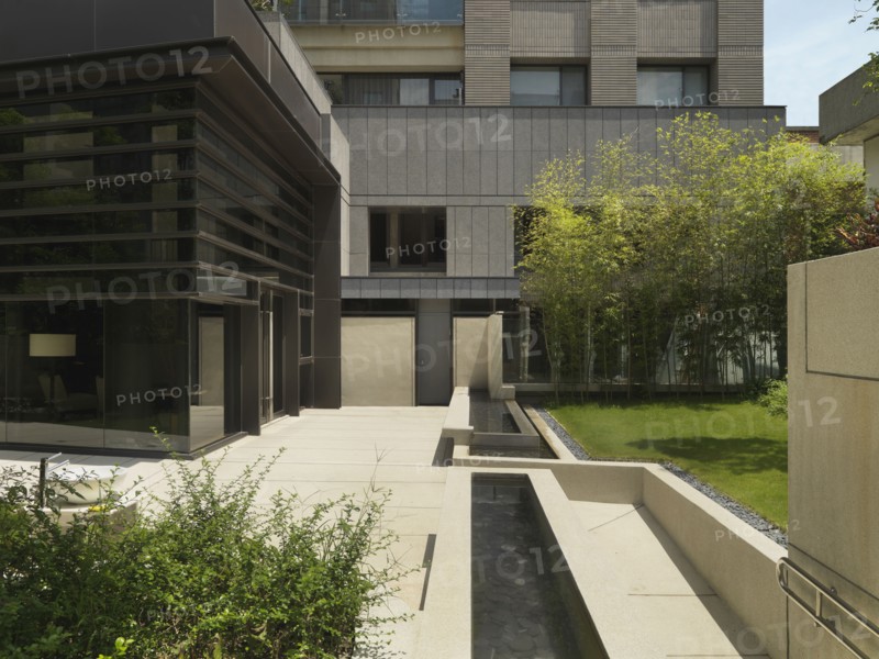 Fountains and terrace outside building