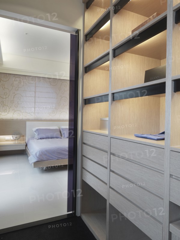 View from walk in closet to master bedroom