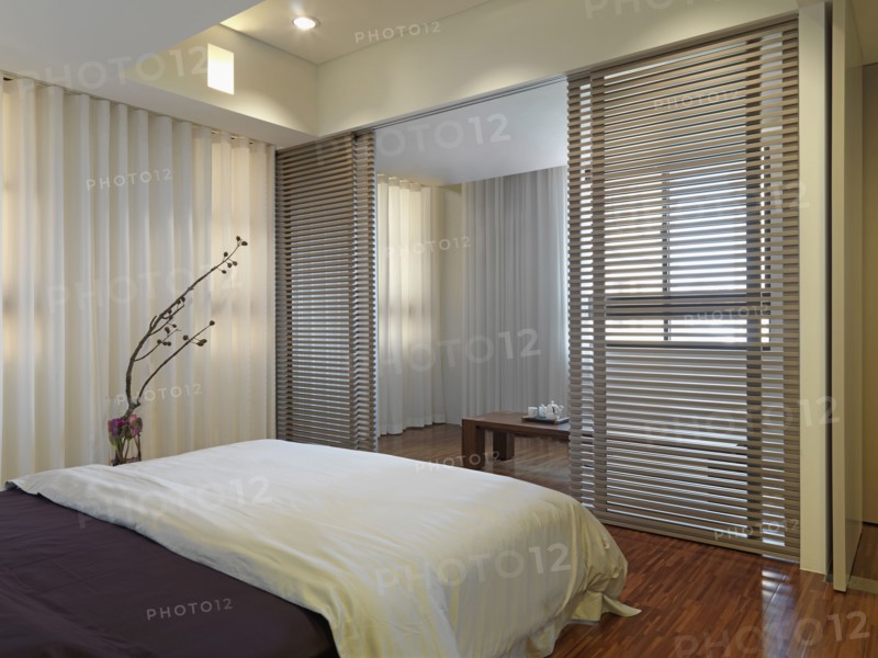 Small bedroom with sliding wooden screens