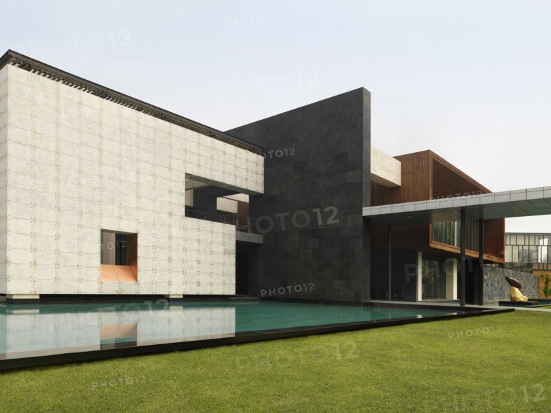 Infinity pool outside of modern building