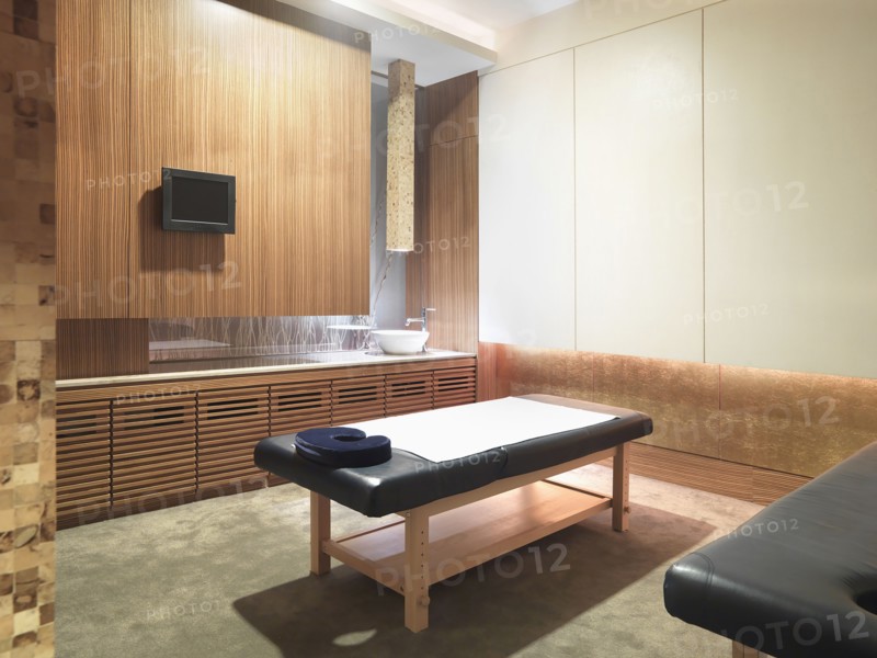 Spa room with massage table