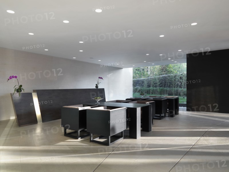 Modern dining area with recessed lighting