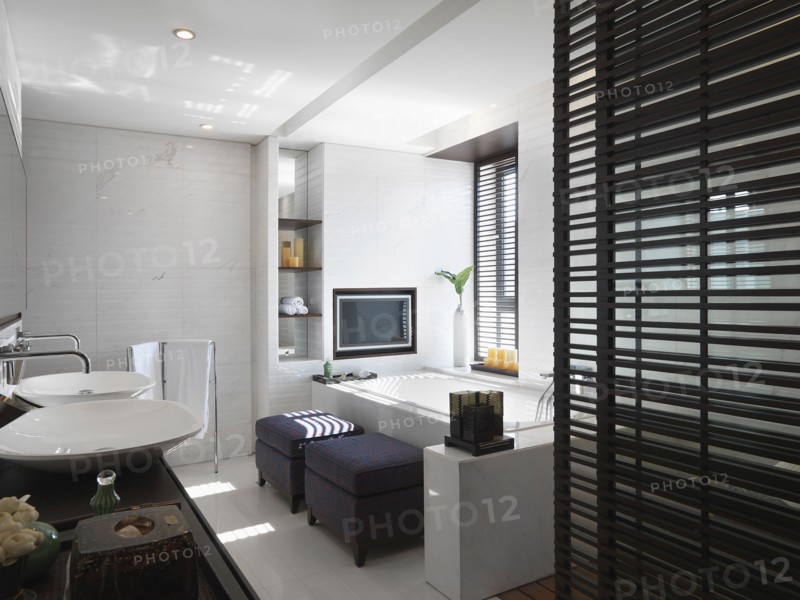 Modern white bathroom with double bowl sinks