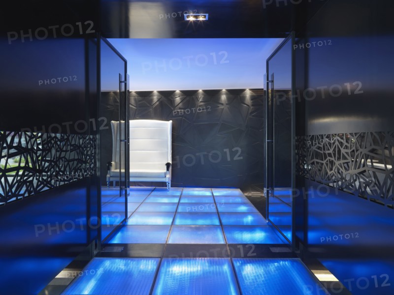 Modern entrance with blue illuminated floor