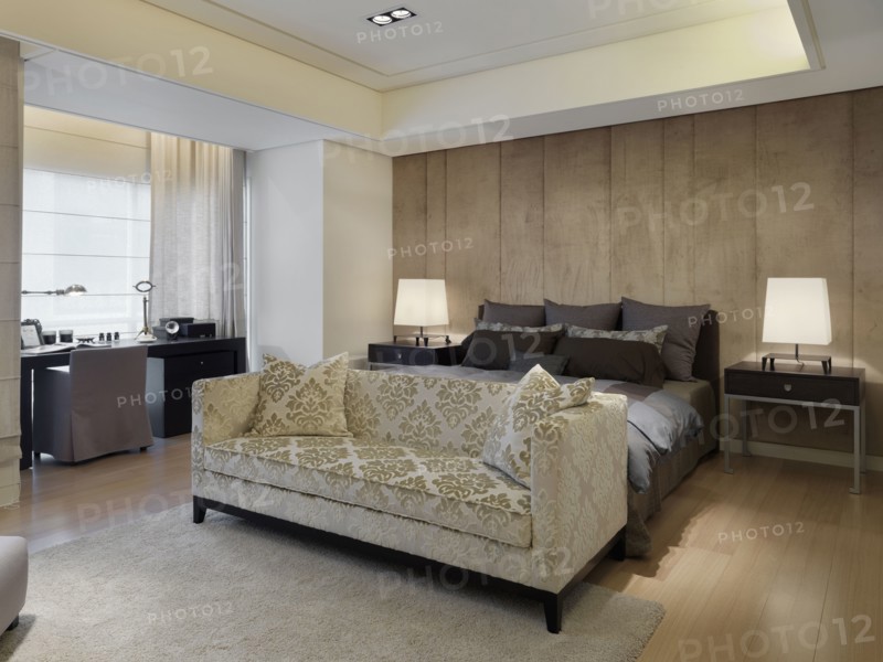 Sofa at foot of bed