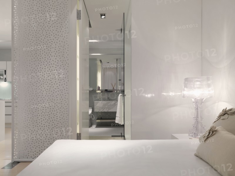 White bedroom and bathroom