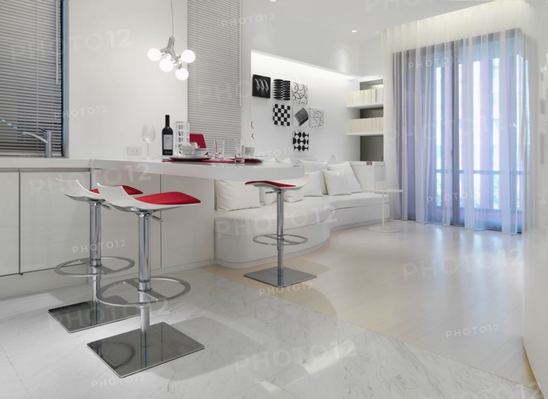 White modern living and dining area