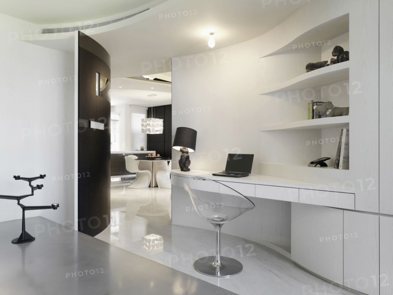 Modern style desk with bunny lamp and clear chair