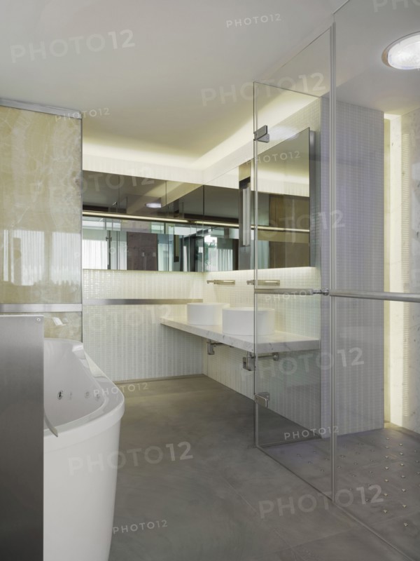 Bathroom with glass walls and door in modern home