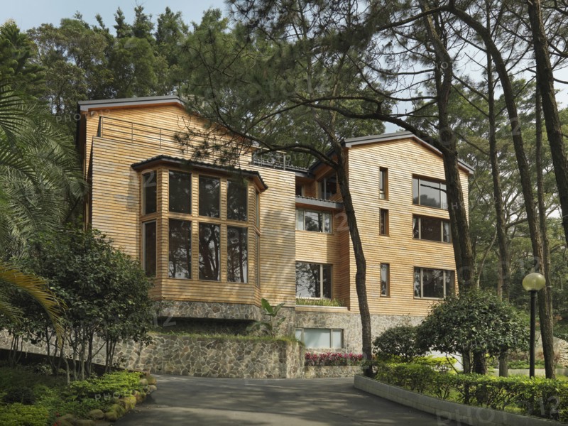 Exterior view of cabin with stone foundation