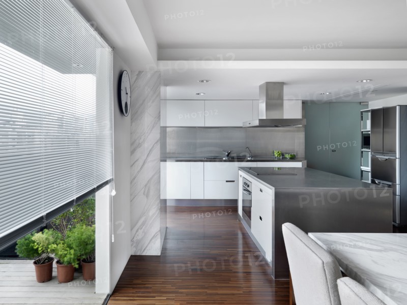 Modern Kitchen and dining room with stainless steel kitchen island