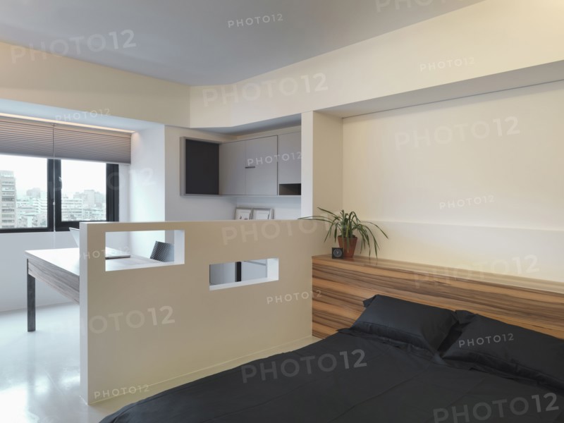 Partial wall separating home office from bedroom