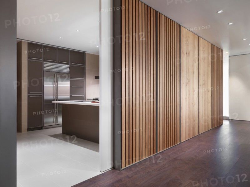 Hallway outside modern kitchen