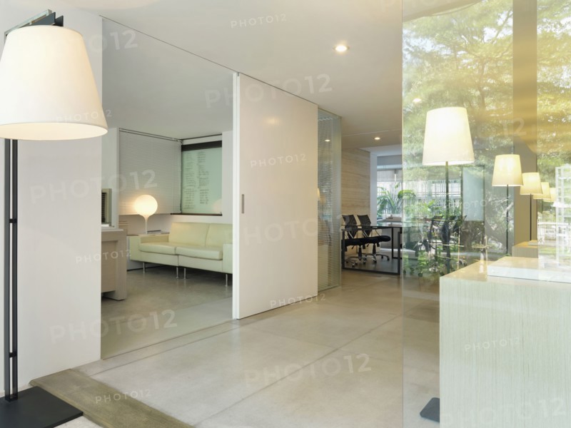 Sliding doors to private office in modern office building
