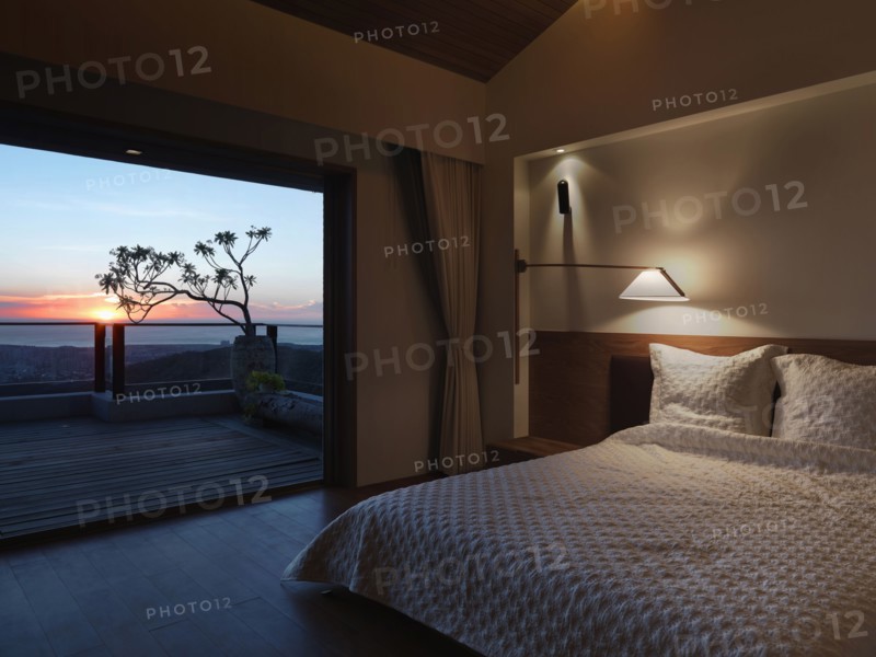 Modern bedroom at sunset