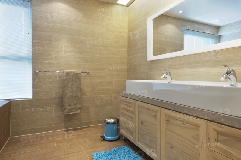 Detail of bathroom cabinets and tile floor
