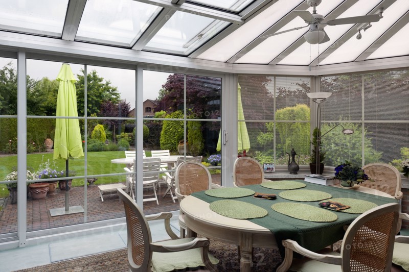 Traditional dining table in sunroom