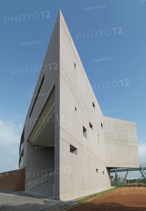 Exterior shot of a commercial building against clear blue sky