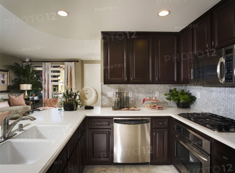 Sophisticated kitchen with tile backsplash