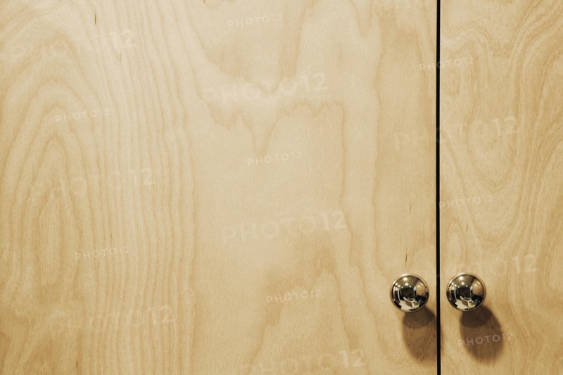 Chrome Knobs on Wood Cupboard