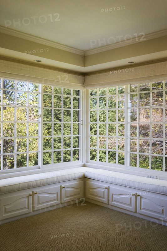 Corner window with benches and cabinets