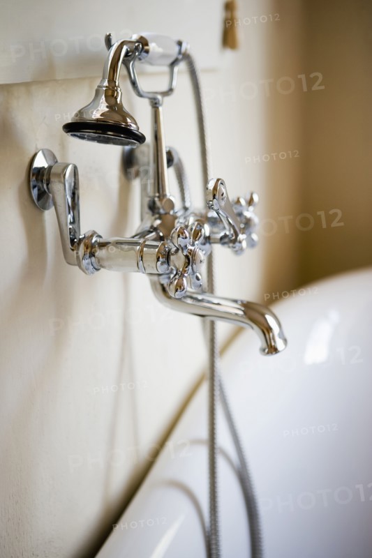 Claw Foot Bathtub and Chrome Faucet