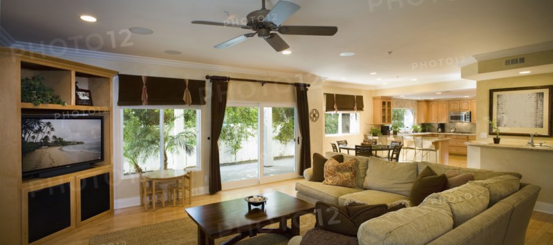 Traditional living room opening up to nook and kitchen