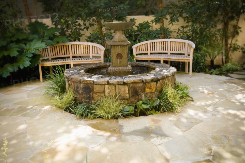 Benches and Fountain in Home Courtyard