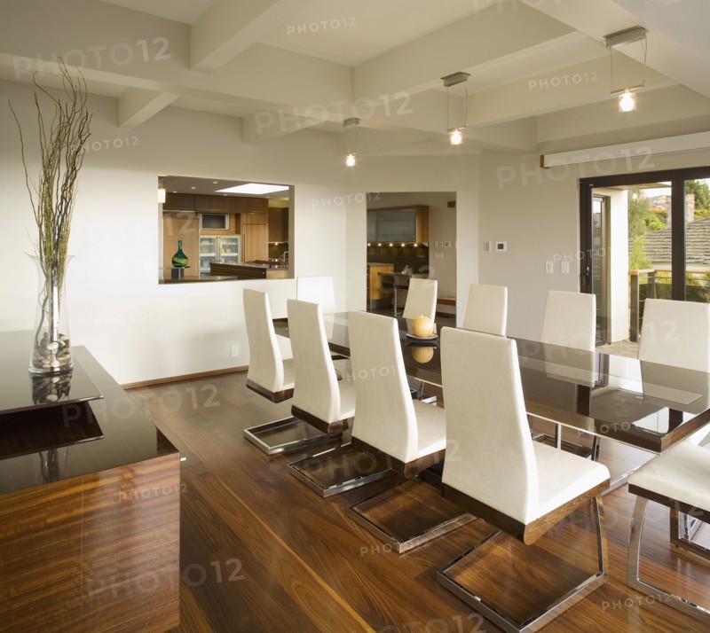 Modern White Dining Room with Hardwood Floors