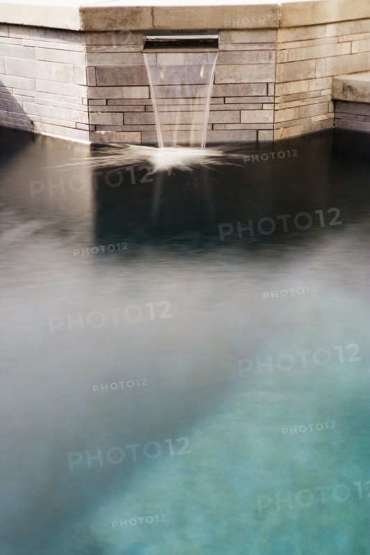 Waterfall from Stone hot tub to Swimming Pool