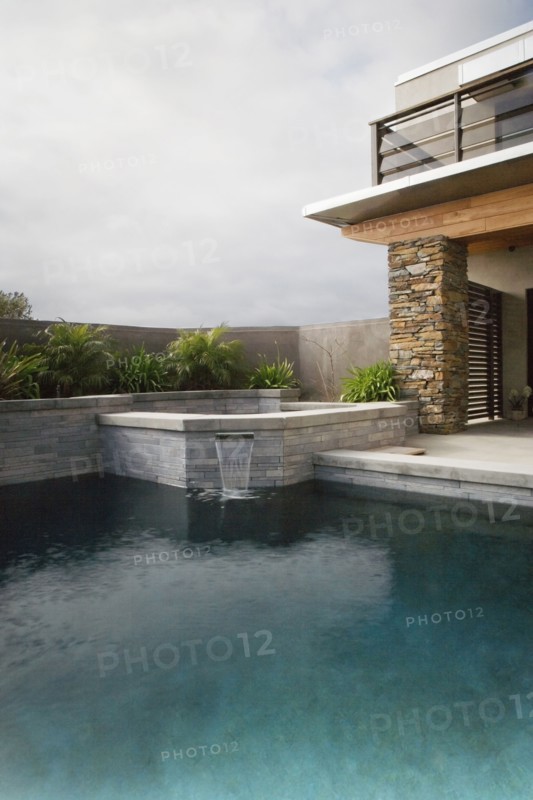 Rear Exterior of Modern Home and Swimming Pool