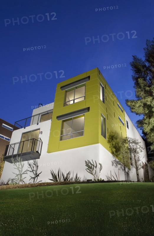 Front Exterior of Modern Condominium at Dusk