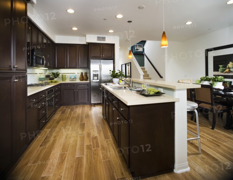 Interior of contemporary kitchen with bar