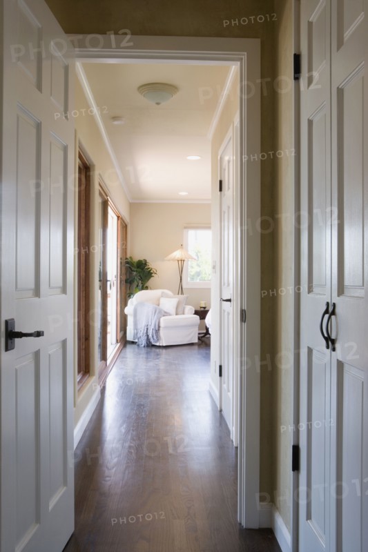 Interior of hallway leading into bedroom
