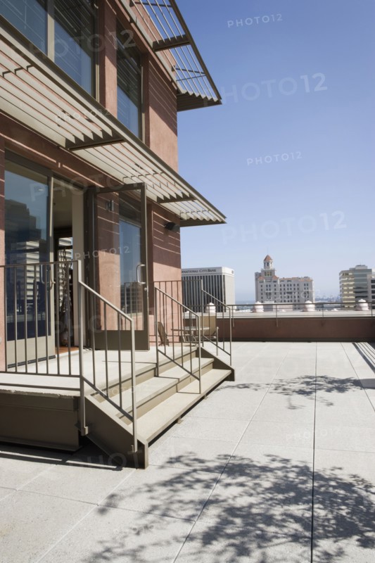 Modern overhang with view of cityscape.