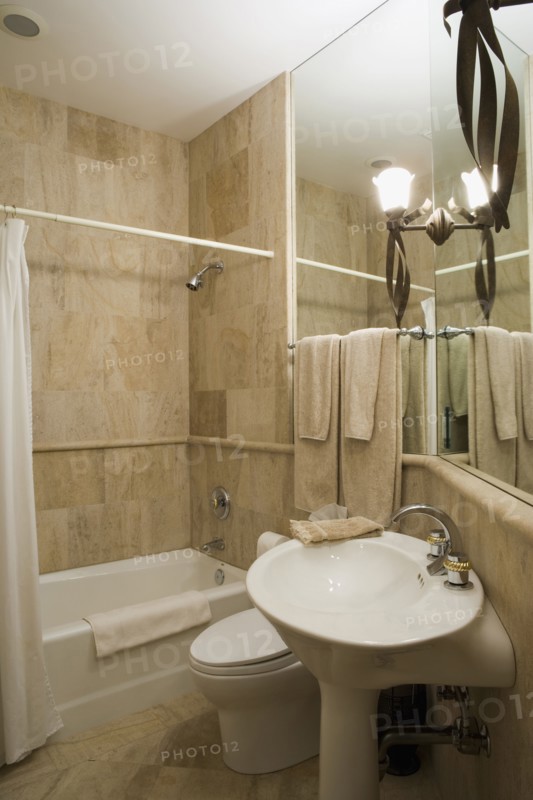 Detail of neutral colored bathroom.