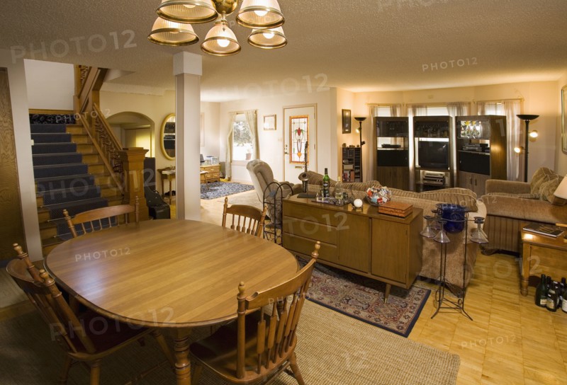 Interior of a large traditional living area with wood floors