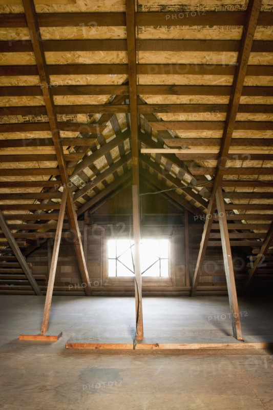 Small window in an unfinished attic