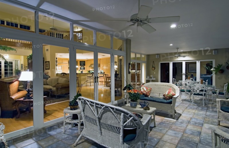 Wicker furniture on patio outside home